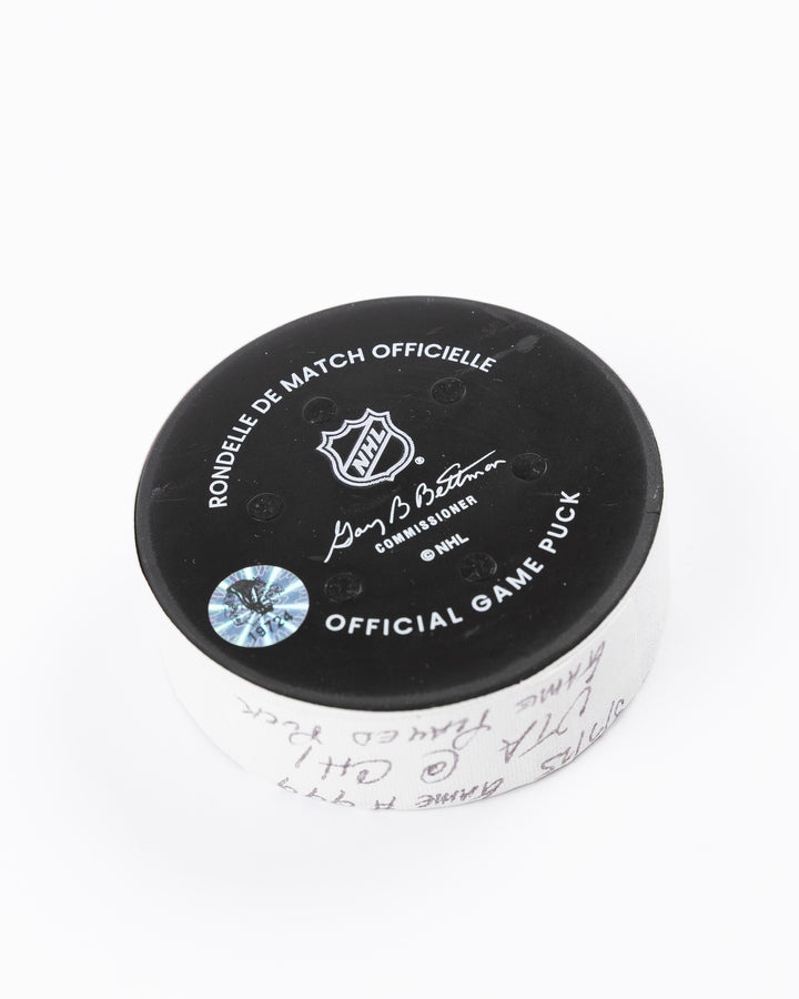 official Chicago Blackhawks hockey puck used in game against Utah Hockey Club on 3/7/25 - back angle lay flat