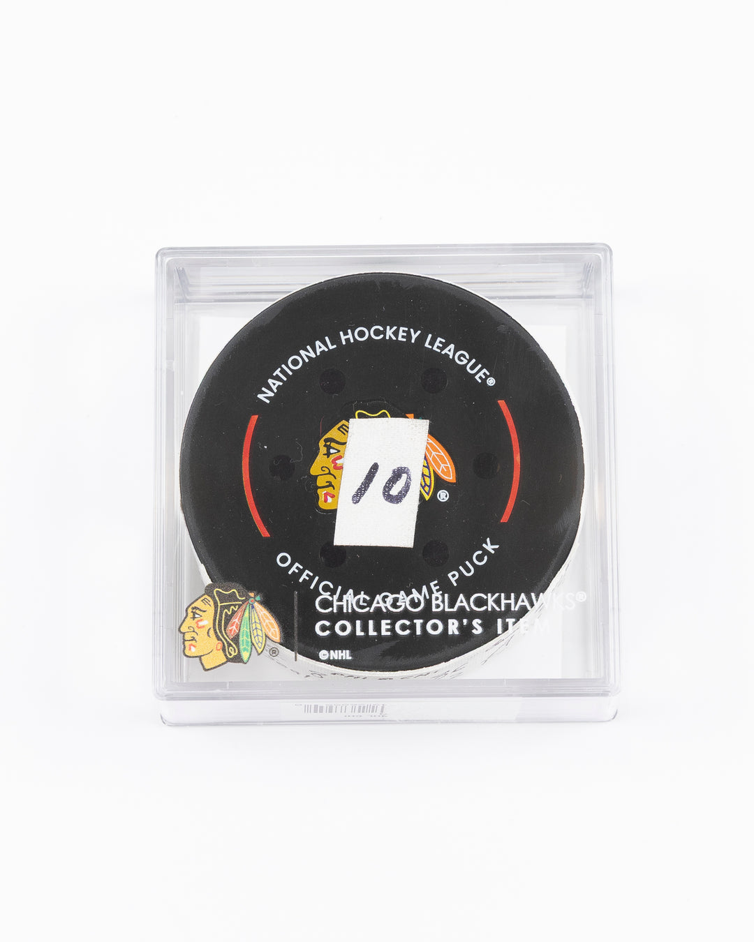 official hockey goal puck scored by Chicago Blackhawks player Ryan Donato on 3/23/25 - front lay flat in case