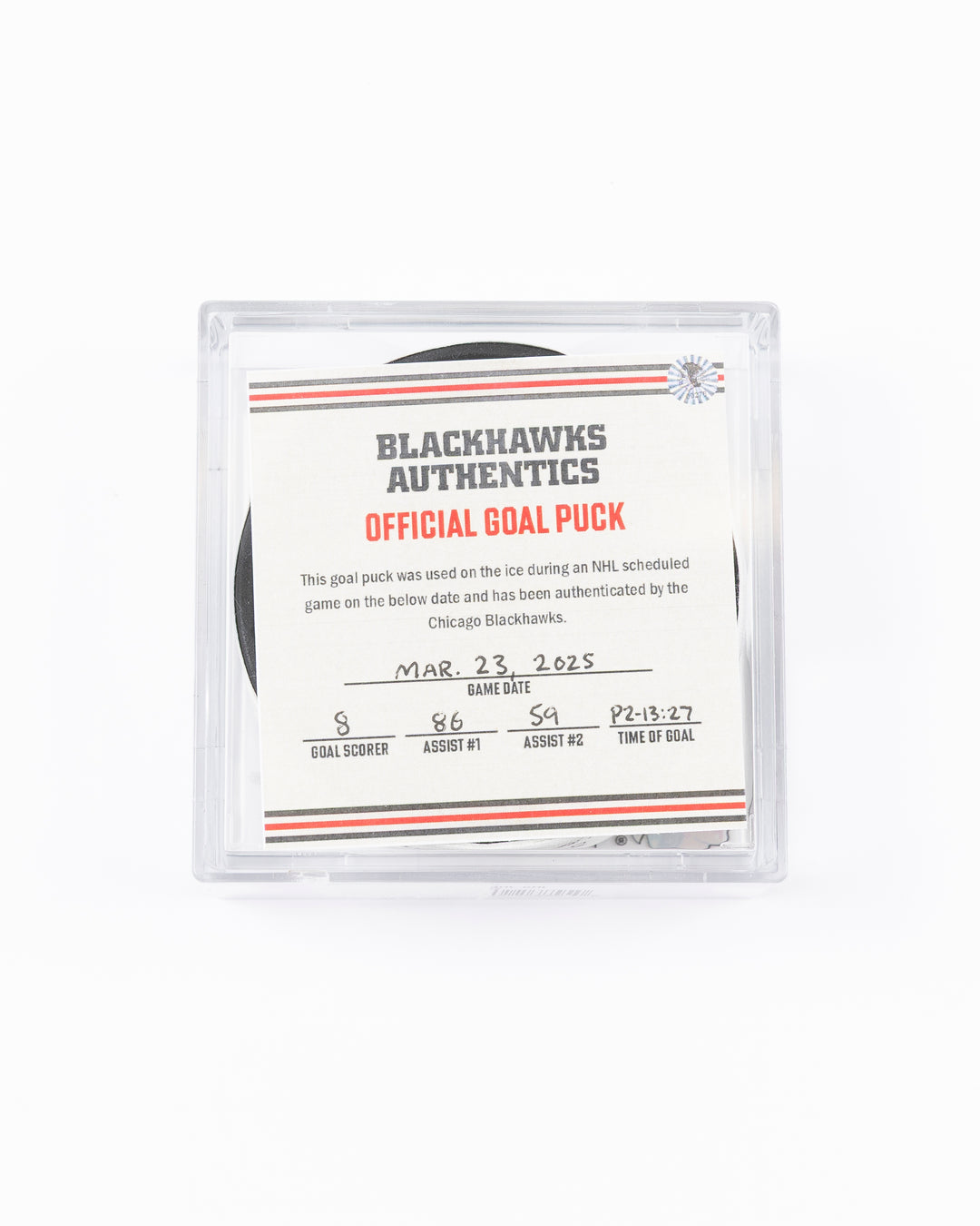 official hockey goal puck scored by Chicago Blackhawks player Ryan Donato on 3/23/25 - front lay flat in case with certificate 