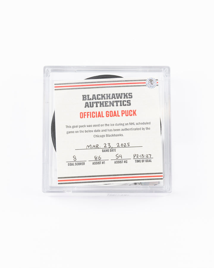 official hockey goal puck scored by Chicago Blackhawks player Ryan Donato on 3/23/25 - front lay flat in case with certificate 