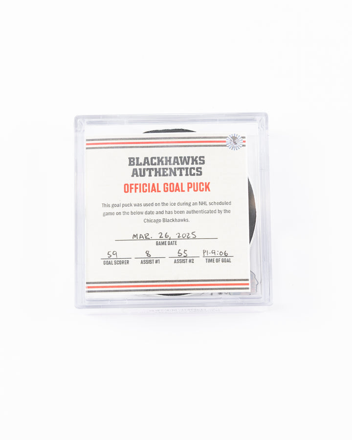 official hockey goal puck used by Chicago Blackhawks player Tyler Bertuzzi on 3/26/25 - front lay flat in case with certificate
