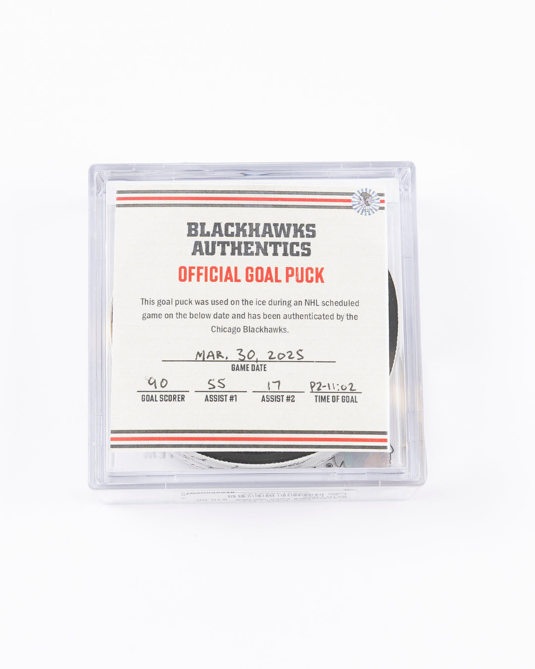 official hockey goal puck scored by Chicago Blackhawks player Joe Veleno on 3/28/25 - front lay flat in case with certificate 
