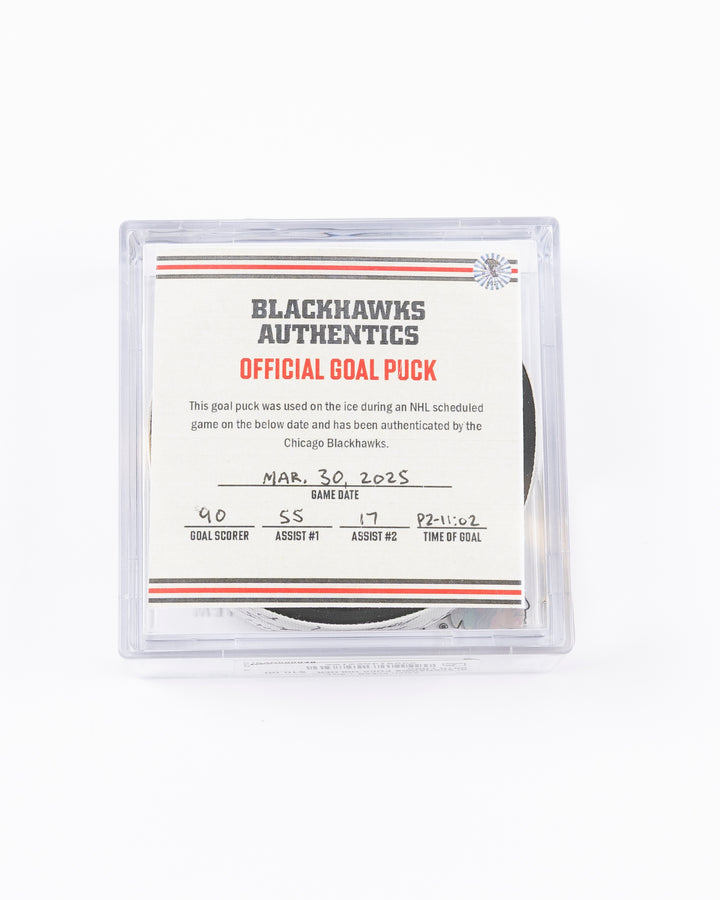 official hockey goal puck scored by Chicago Blackhawks player Joe Veleno on 3/28/25 - front lay flat in case with certificate 