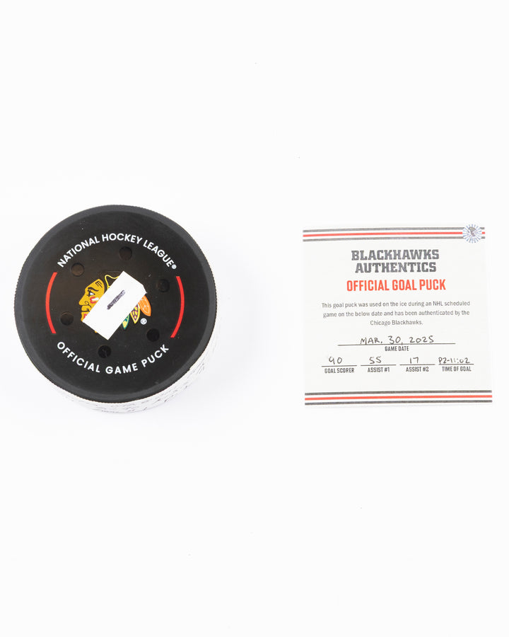 official hockey goal puck scored by Chicago Blackhawks player Joe Veleno on 3/28/25 - front lay flat puck and certificate 