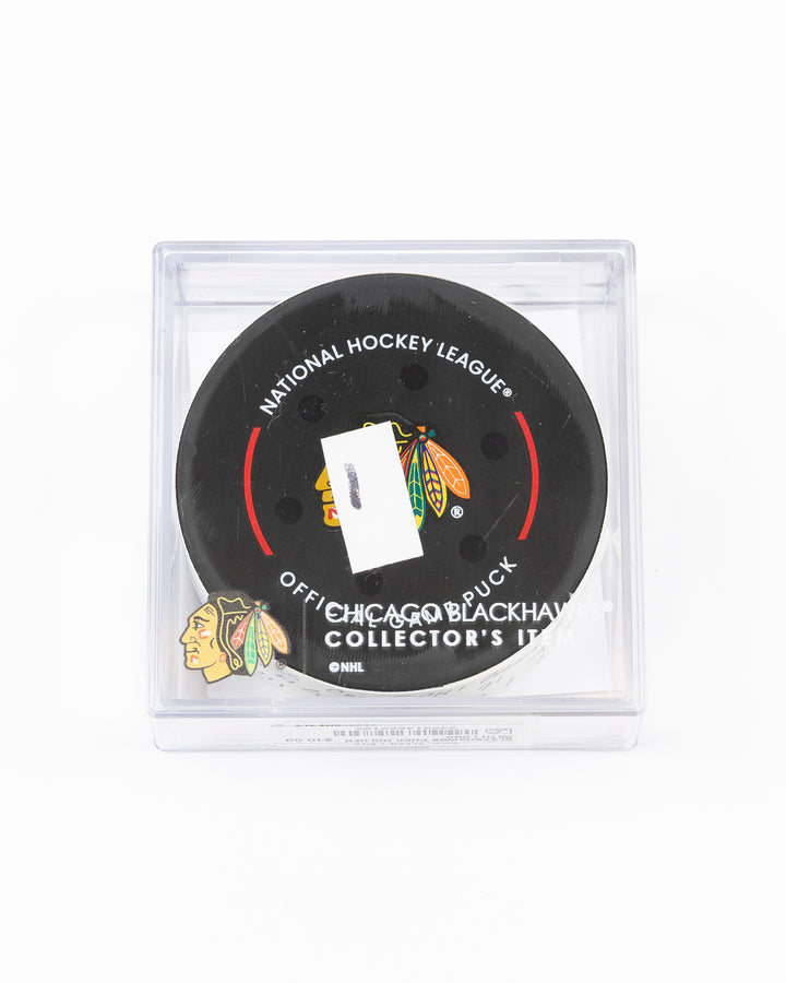 official hockey goal puck scored by Chicago Blackhawks player Ilya Mikheyev on 4/2/25 - front lay flat in case