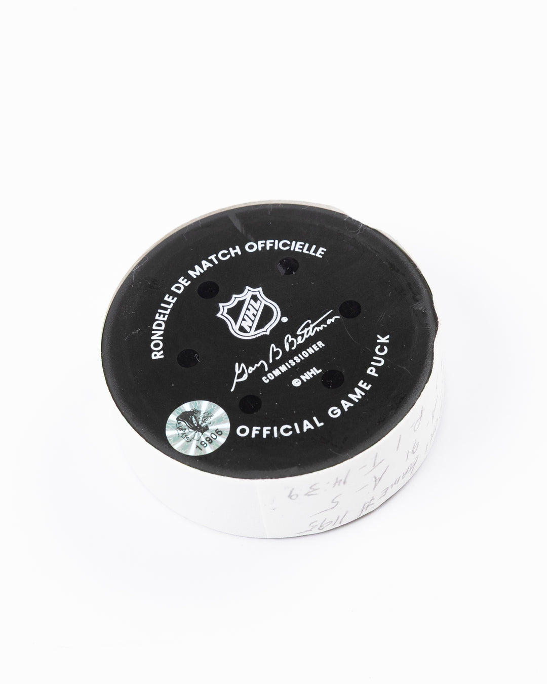 official hockey goal puck scored by Chicago Blackhawks player Ilya Mikheyev on 4/2/25 - back angle lay flat