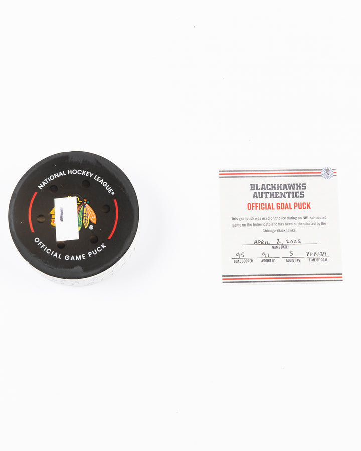 official hockey goal puck scored by Chicago Blackhawks player Ilya Mikheyev on 4/2/25 - front lay flat puck and certificate