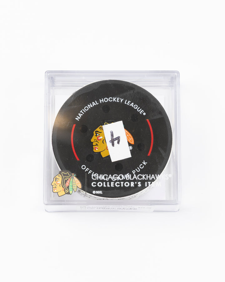 official hockey goal puck scored by Chicago Blackhawks player Ilya Mikheyev - front lay flat in case