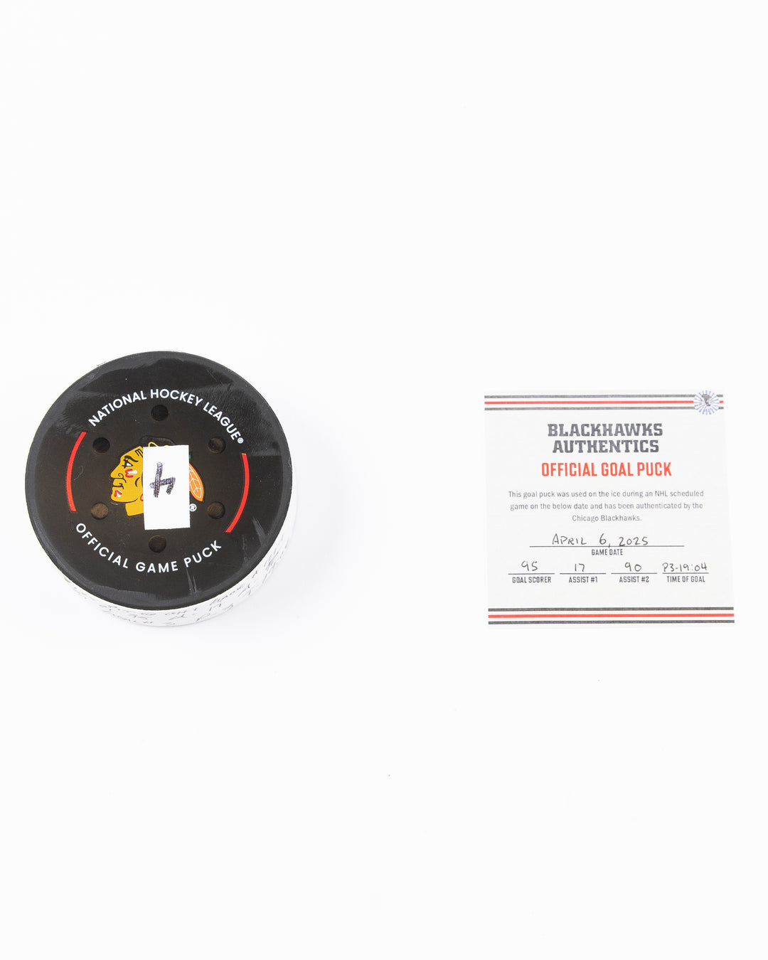official hockey goal puck scored by Chicago Blackhawks player Ilya Mikheyev - front lay flat puck and certificate