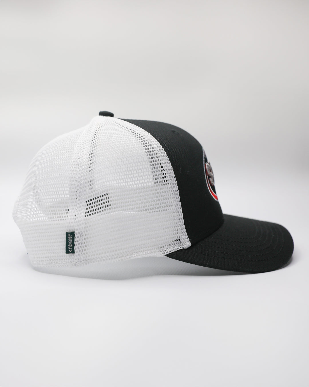 black and white adjustable trucker with embroidered Chicago Steel logo on front - right side lay flat