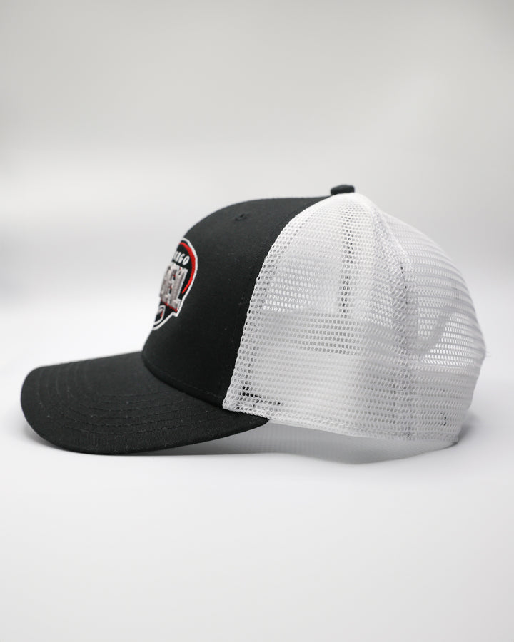 black and white adjustable trucker with embroidered Chicago Steel logo on front - left side lay flat