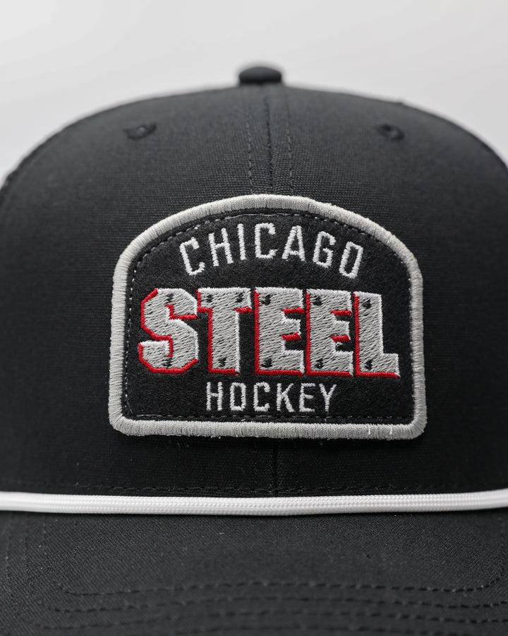 black rope trucker cap with Chicago Steel hockey patch embroidered on front - front detail lay flat