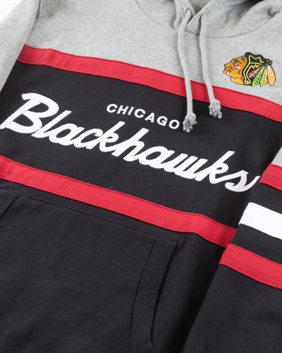 Mitchell & Ness grey and black hoodie with Chicago Blackhawks wordmark and primary logo on front - detail front lay flat