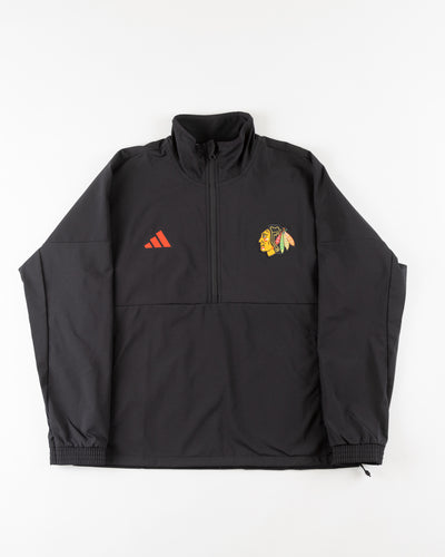 black adidas quarter zip with Chicago Blackhawks primary logo on left chest - front lay flat