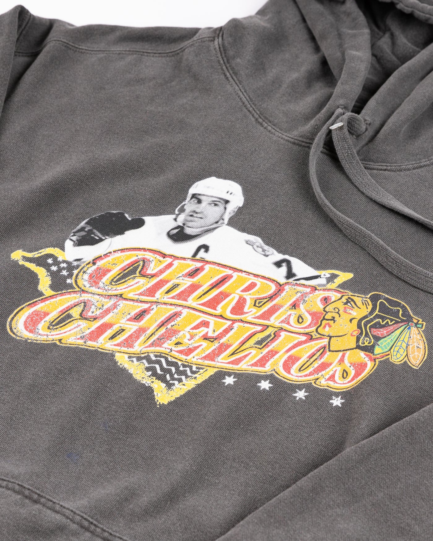 grey Chris Chelios vintage inspired hoodie with Chicago Blackhawks branding - front detail lay flat