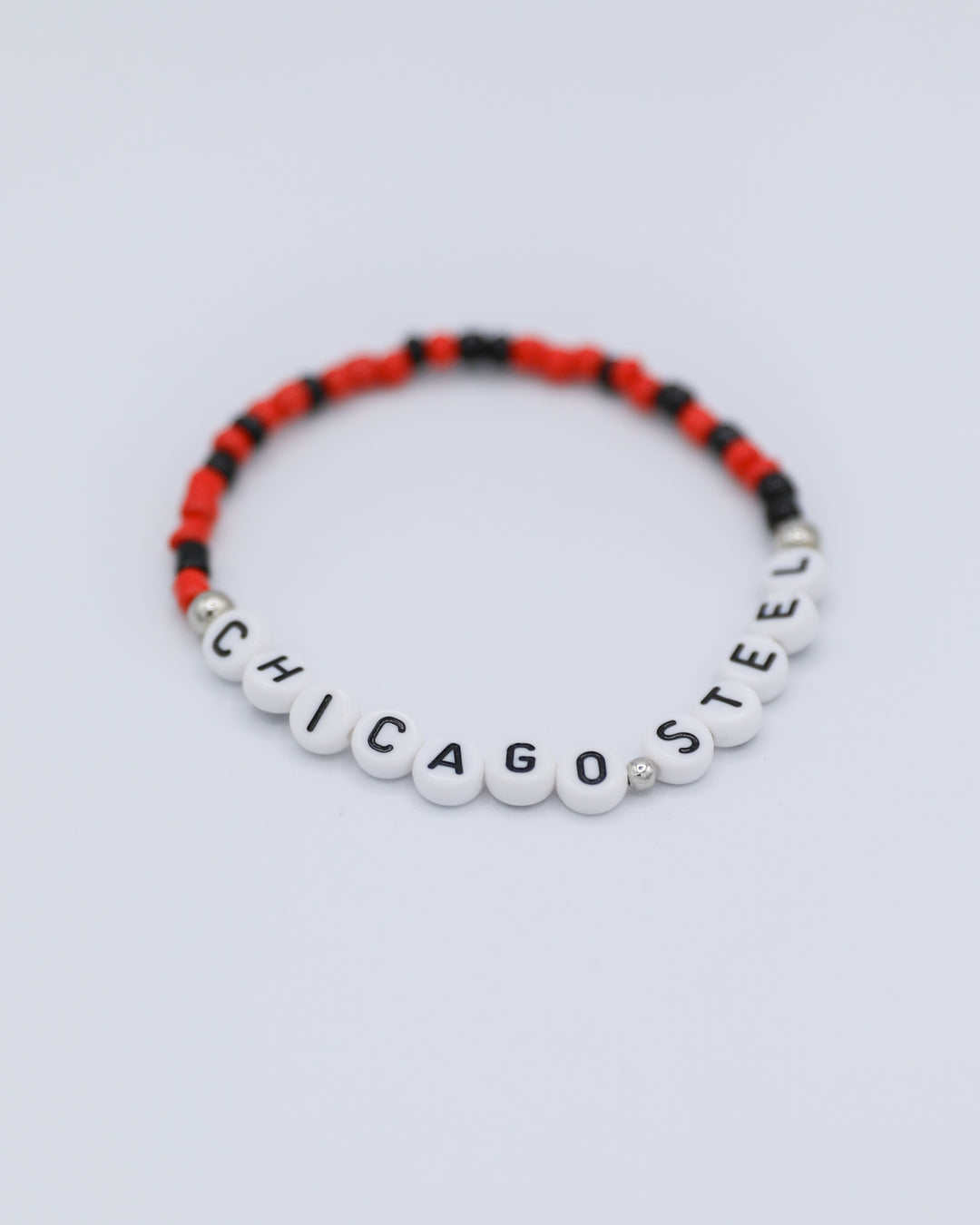 red and black Chicago Steel friendship bracelets inspired by Eras tour - red and black front angle lay flat