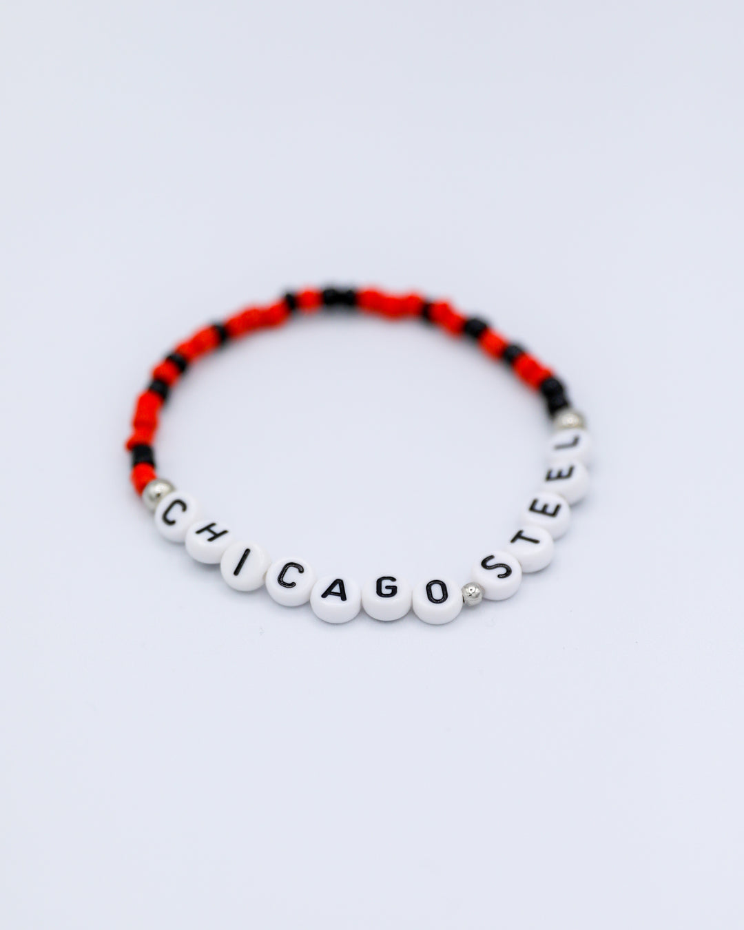 red and black Chicago Steel friendship bracelets inspired by Eras tour - red and black alt angle lay flat