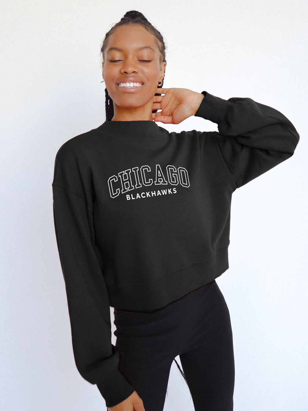 black cropped mock neck sweater with Chicago Blackhawks wordmark - on model
