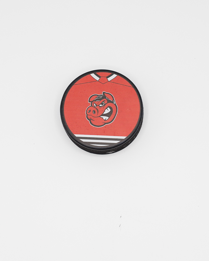 black hockey puck with Rockford IceHogs red jersey and Hammy graphic design on front - front lay flat