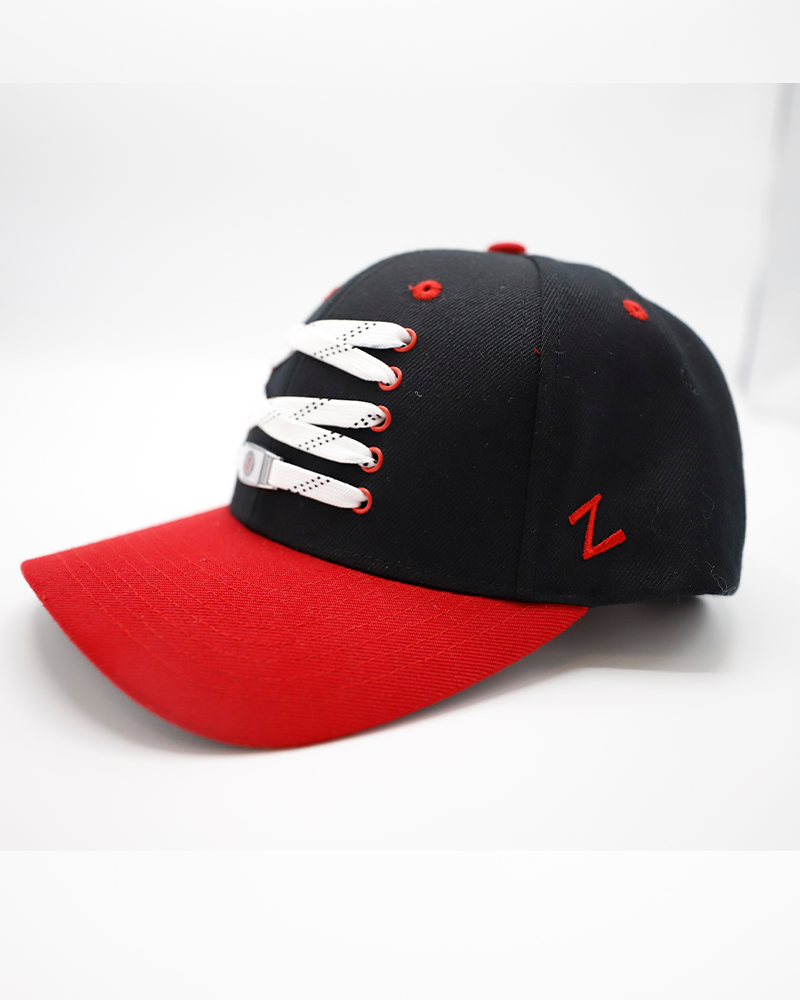 black and red Zephyr hat with lace detailing on front with Rockford IceHogs Hammy on bottom lace - left angle lay flat