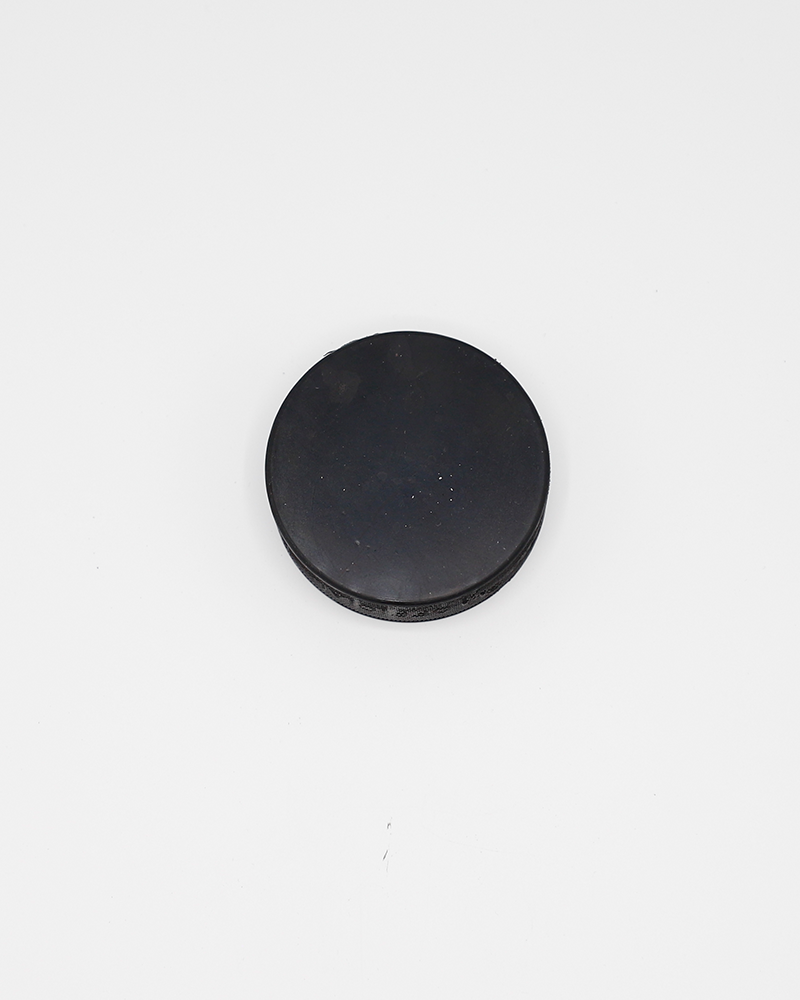 black hockey puck with close up Rockford IceHogs Hammy graphic on front - back lay flat