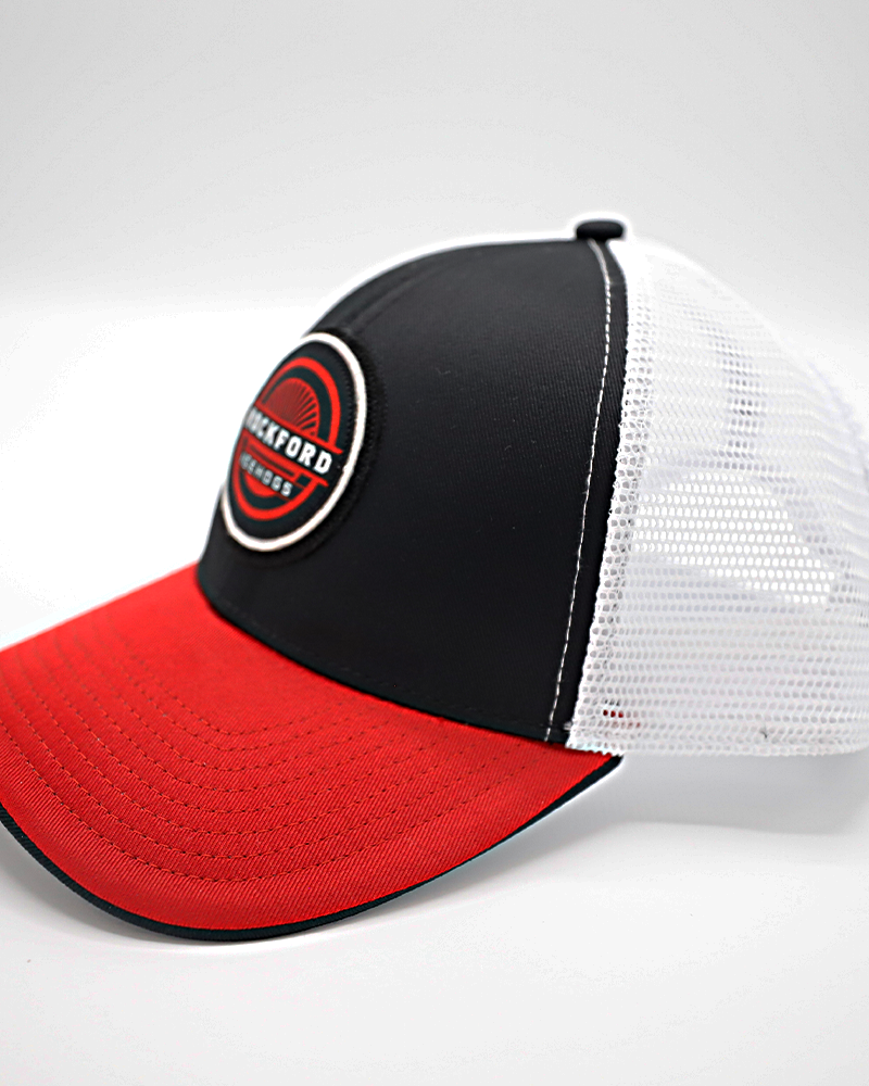 black red and white trucker hat with Rockford IceHogs rounded patch on black panel and red brim hat with white mesh - left side lay flat