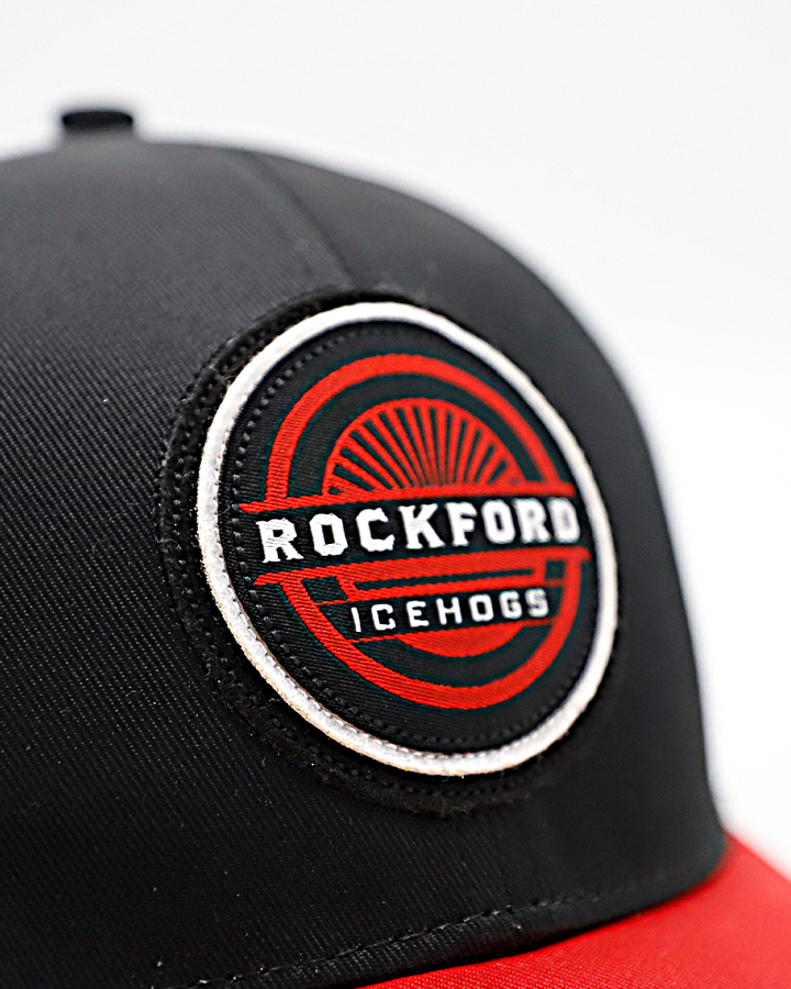 black red and white trucker hat with Rockford IceHogs rounded patch on black panel and red brim hat with white mesh - front detail lay flat