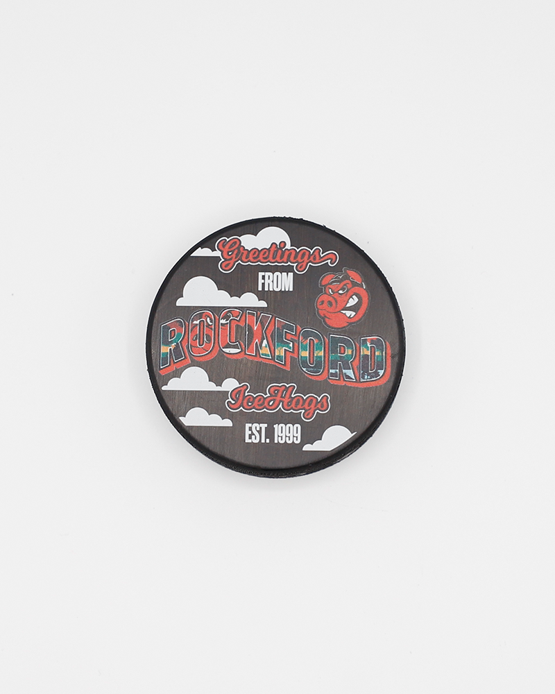 black hockey puch with Greetings from Rockford graphic across front and Rockford IceHogs branding - front lay flat