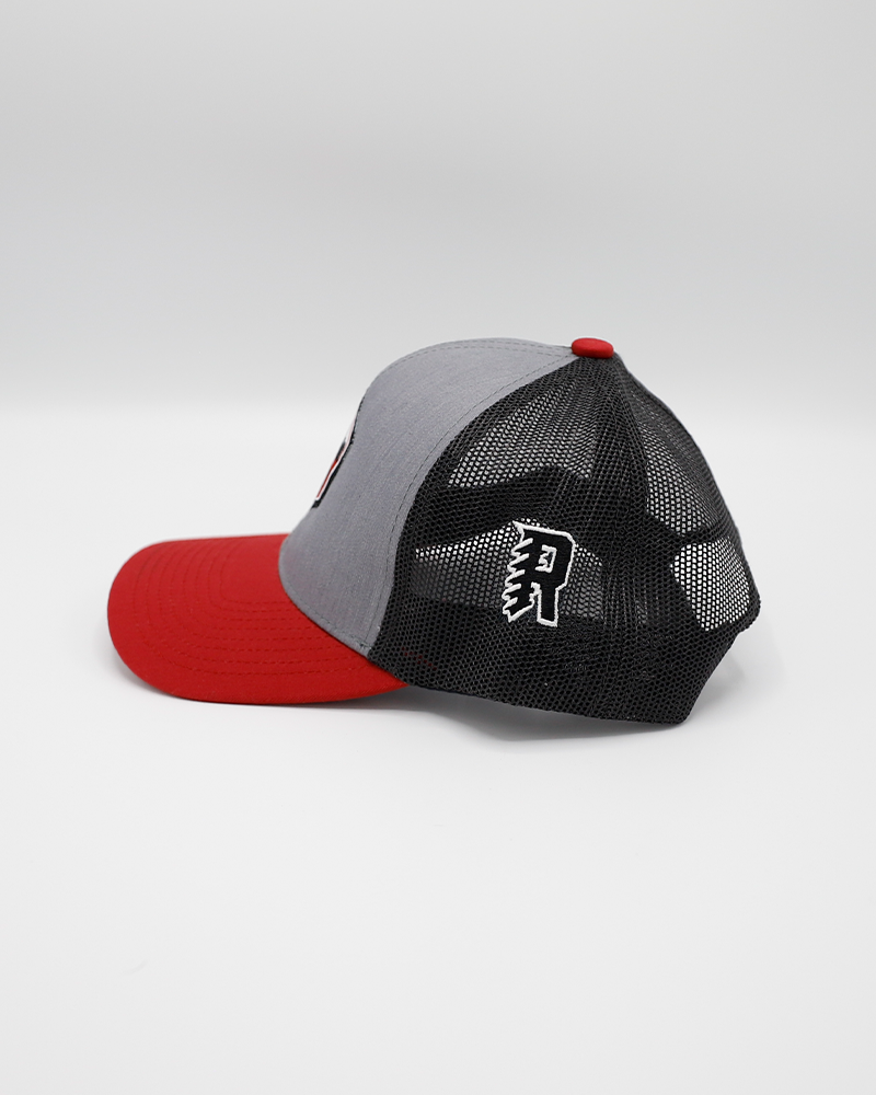 black grey and red trucker hat with Rockford IceHogs Screw City hexagon logo patch on front - left side lay flat