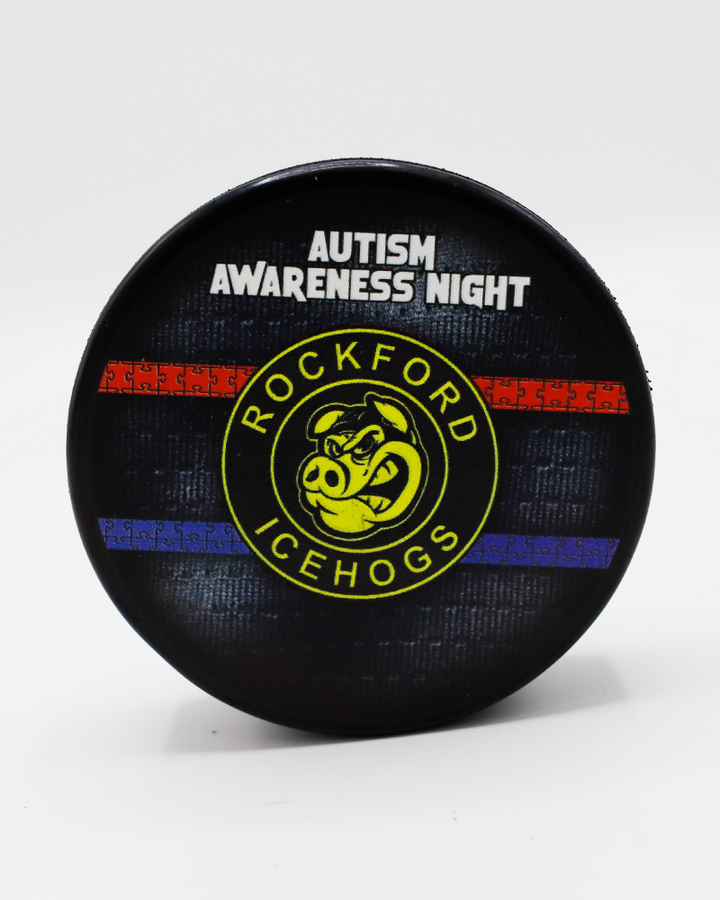 black Rockford IceHogs hockey puck with Autism Awareness Night graphic on front - front lay flat