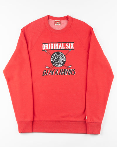 red Homage Chicago Blackhawks crewneck with vintage logo and Original Six wordmark graphic across front - front lay flat