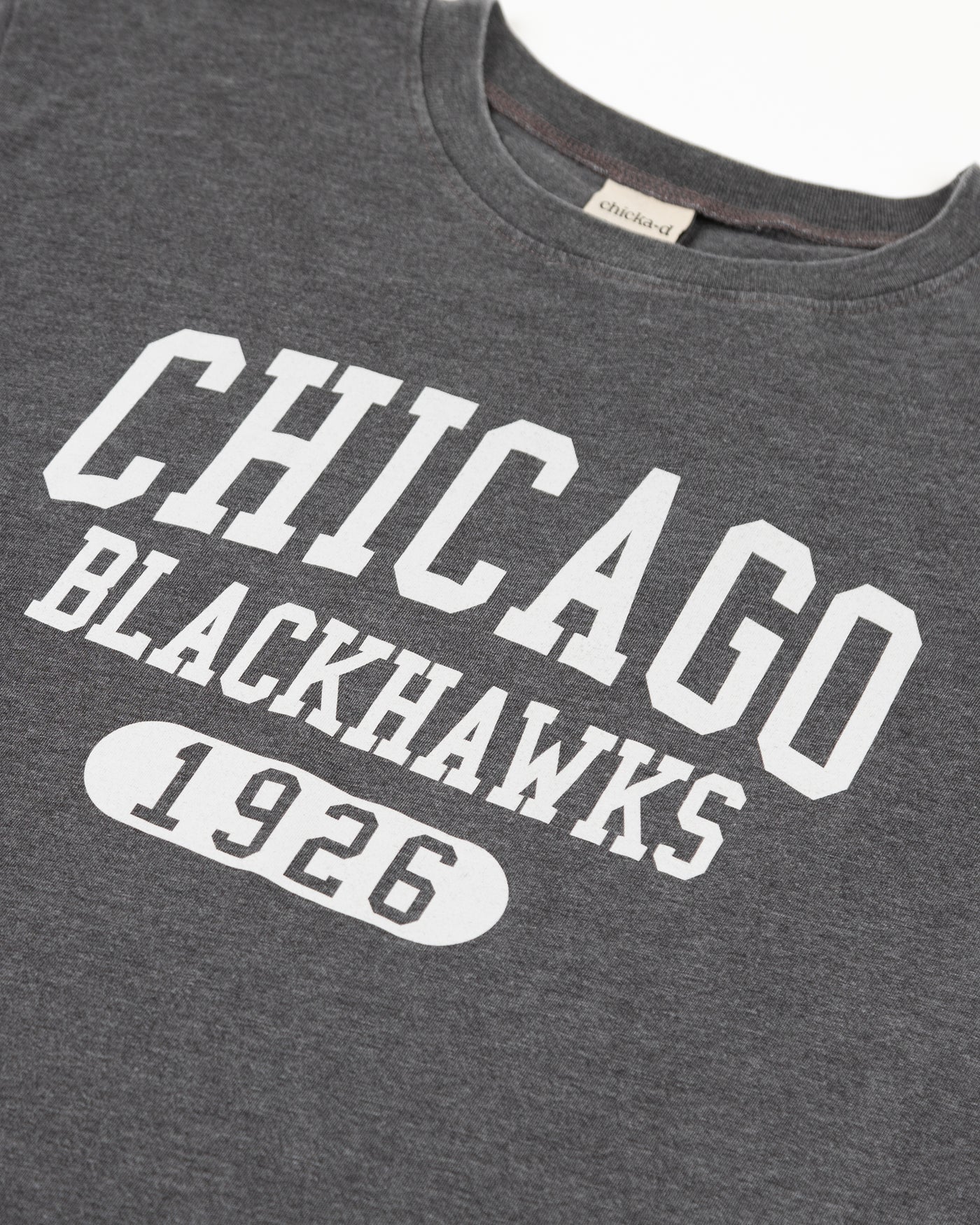 black chicka-d oversized women's tee with Chicago Blackhawks wordmark graphic across chest - detail lay flat