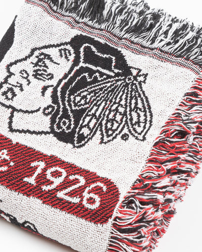 Julia Gash blanket with Chicago and Chicago Blackhawks inspired all over design - detail front lay flat