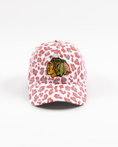 white New Era women's cap with all over pink cheetah print and Chicago Blackhawks primary logo on front - front lay flat