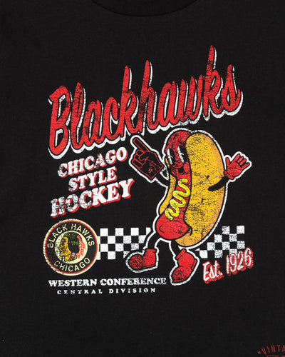 black kids size Mitchell & Ness tee with Chicago Blackhawks vintage logo and animated hot dog graphic - detail lay flat