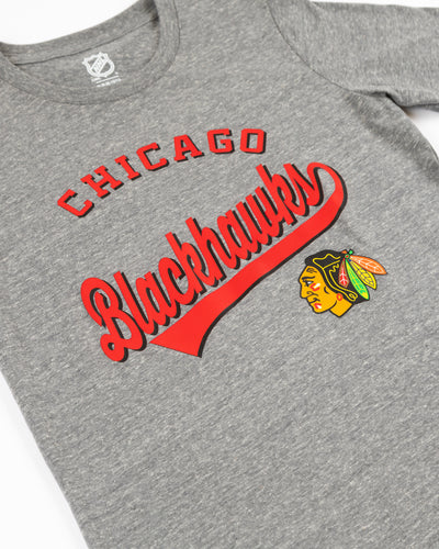 grey youth Outerstuff tee with Chicago Blackhawks wordmark and primary logo graphic across chest - detail lay flat