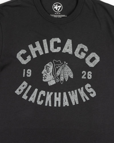 washed black '47 brand tee with Chicago Blackhawks primary logo and wordmark graphic across chest - detail lay flat