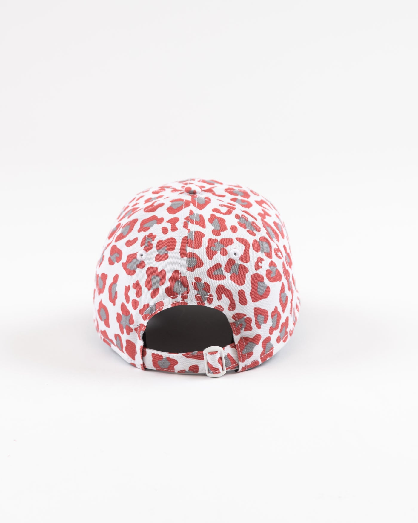 white New Era women's cap with all over pink cheetah print and Chicago Blackhawks primary logo on front - back angle lay flat