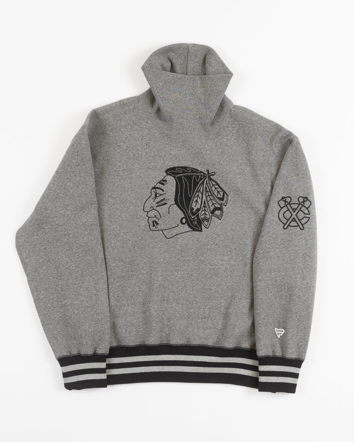 grey Todd Snyder x Chicago Blackhawks turtleneck sweater made with Fanatics with vintage logo on front and secondary logo on left shoulder - front lay flat