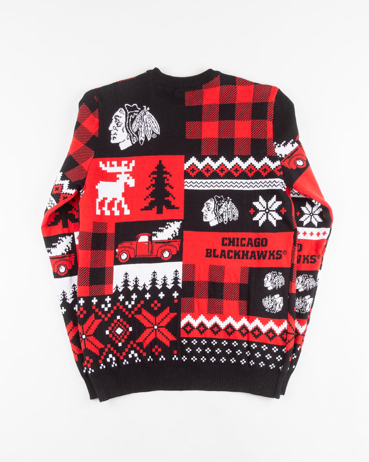 red and black ugly Christmas sweater with Chicago Blackhawks branding - back lay flat