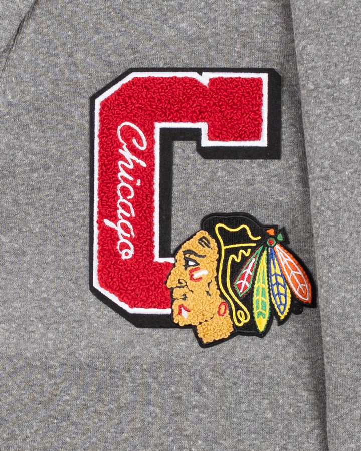 grey Sportiqe cardigan with Chicago Blackhawks C and primary logo embroidered on left chest - patch detail lay flat