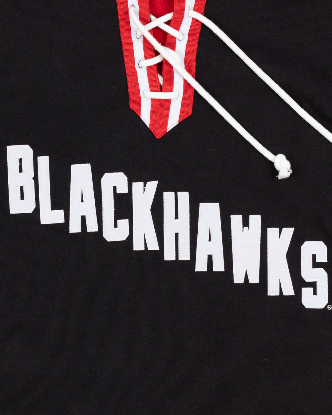 black and red Champion hoodie with Chicago Blackhawks diagonal wordmark across front - front detail lay flat