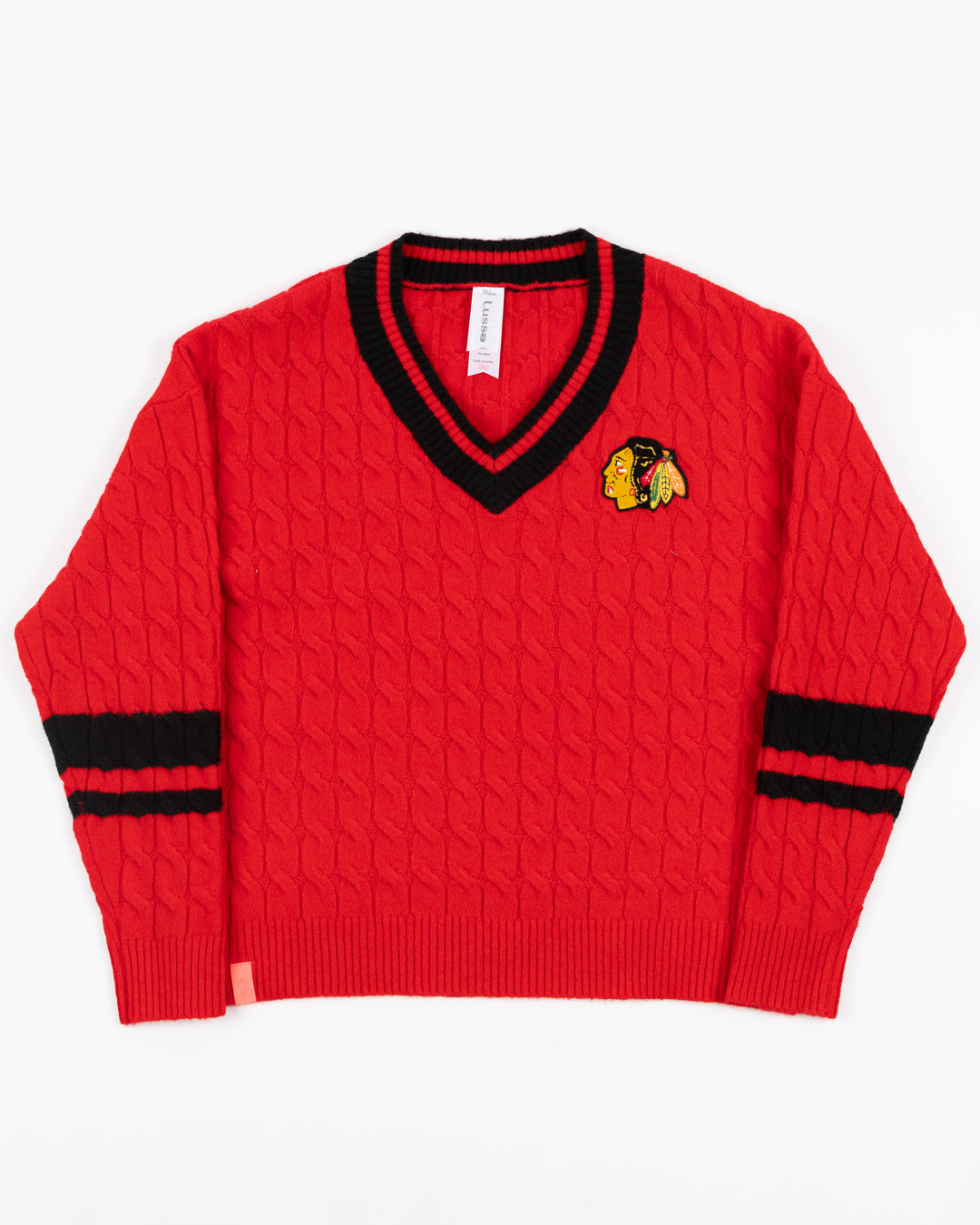 red Lusso v-neck sweater with Chicago Blackhawks primary logo on left chest - front lay flat