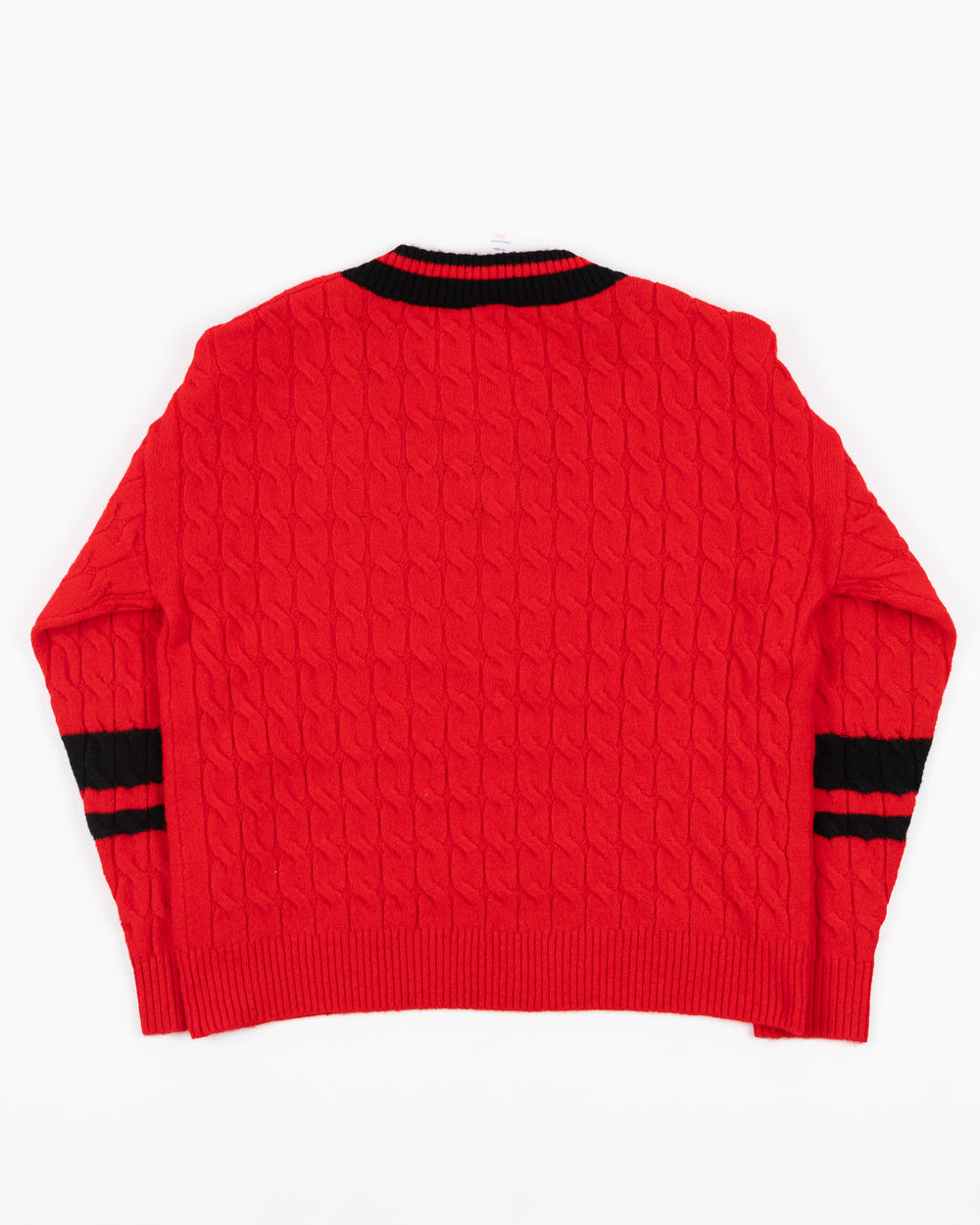 red Lusso v-neck sweater with Chicago Blackhawks primary logo on left chest - back lay flat