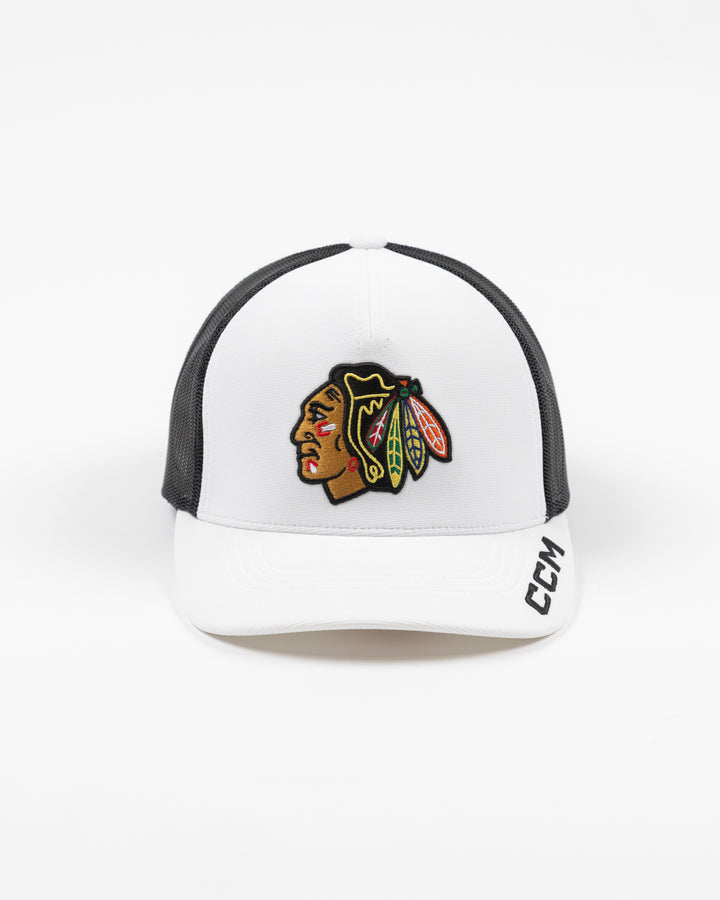 white and black CCM trucker cap with Chicago Blackhawks primary logo embroidered on front and CCM logo on brim - front lay flat