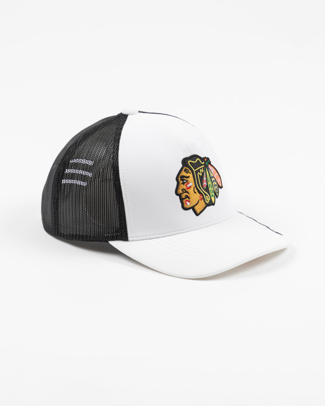 white and black CCM trucker cap with Chicago Blackhawks primary logo embroidered on front and CCM logo on brim - right angle lay flat