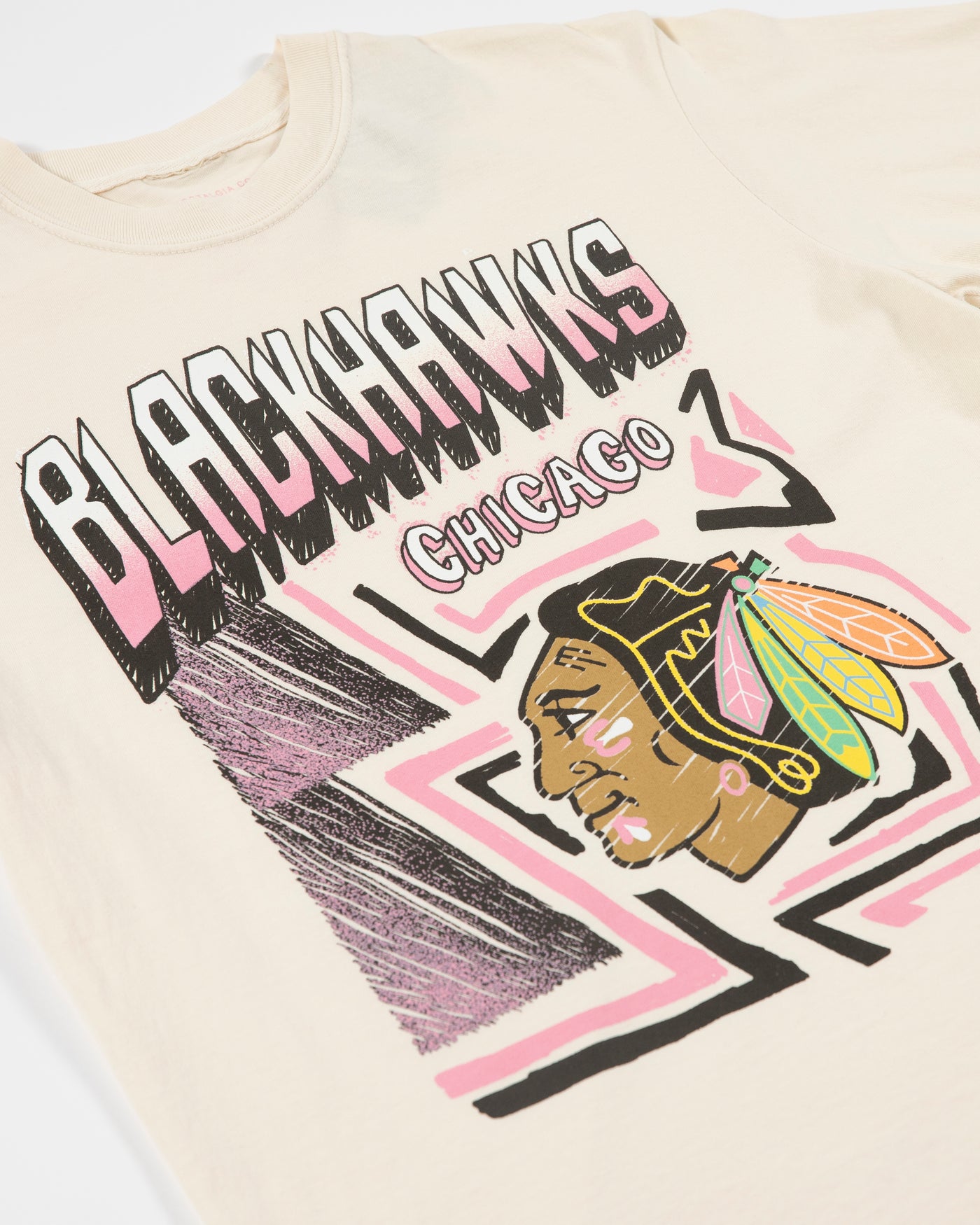 cream Mitchell & Ness short sleeve tee with Chicago Blackhawks sketch graphic across front - detail lay flat