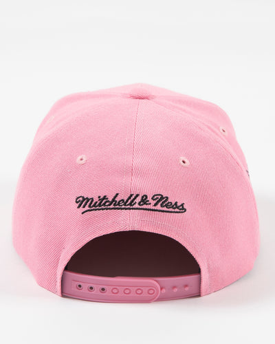 Mitchell & Ness pink snapback with Chicago Blackhawks primary logo embroidered on the front with pink accents - back lay flat