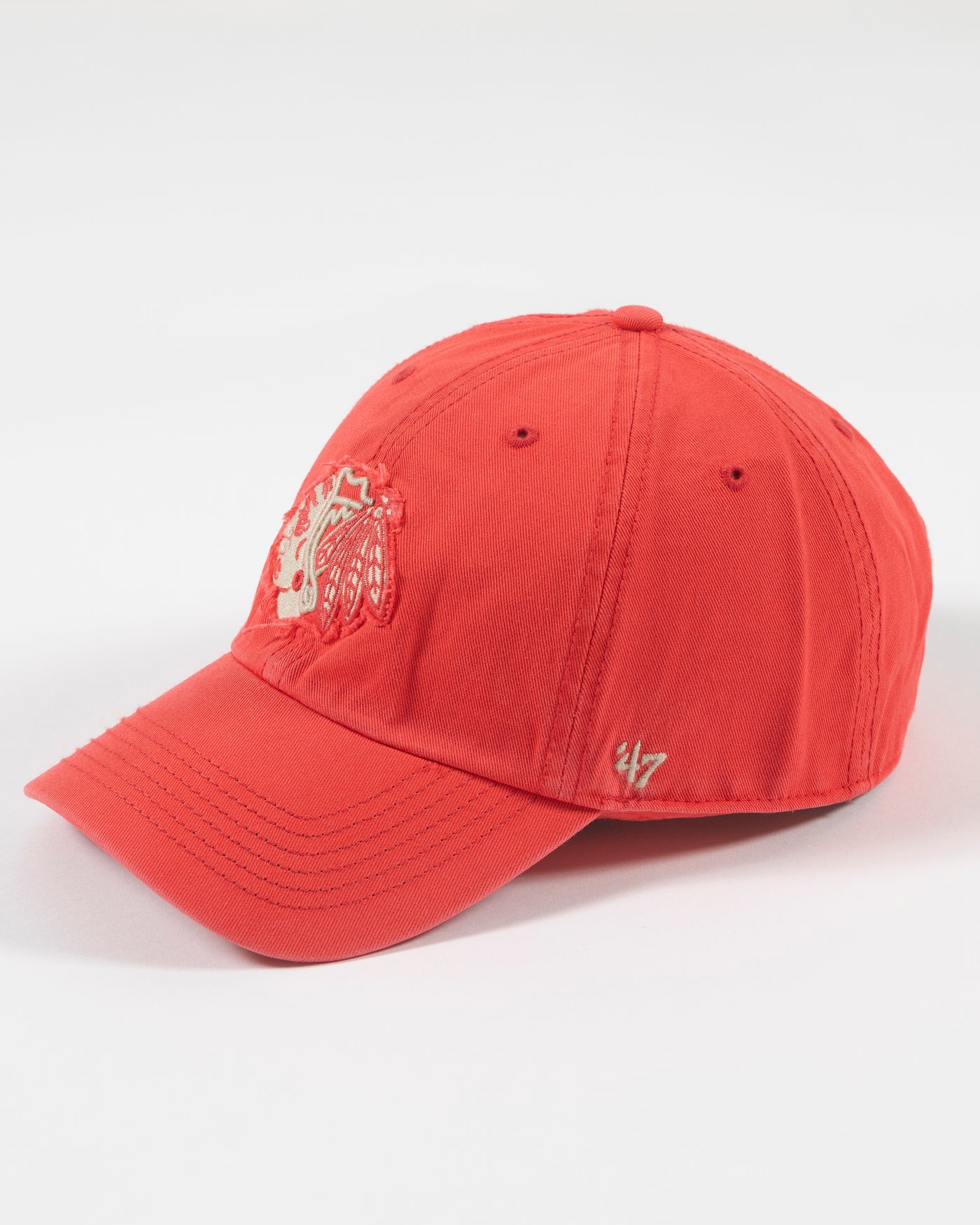 orange '47 brand adjustable cap with Chicago Blackhawks tonal primary logo with distress detailing - left angle lay flat
