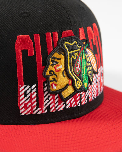 Mitchell & Ness Chicago Blackhawks snapback with red brim and primary logo with cross check wordmark embroidered on front panel - detail lay flat